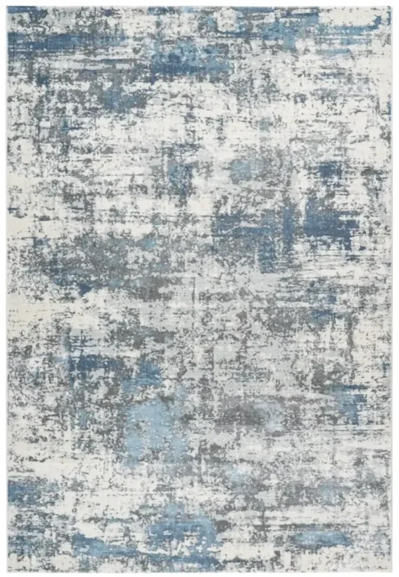 Abstraktný koberec Paríž v modrej farbe - Pierre Cardin - M