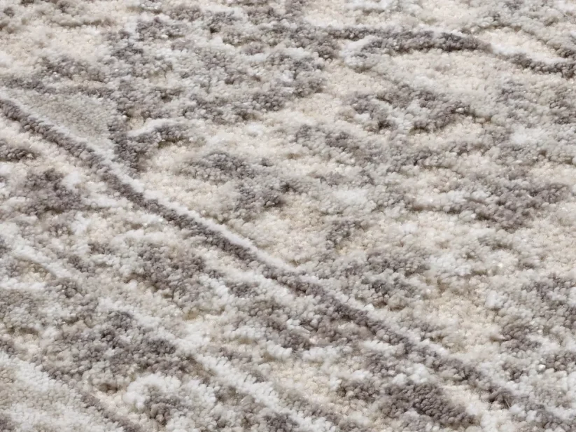 Zemitý koberec pod posteľ Vella s orientálnym motívom - L