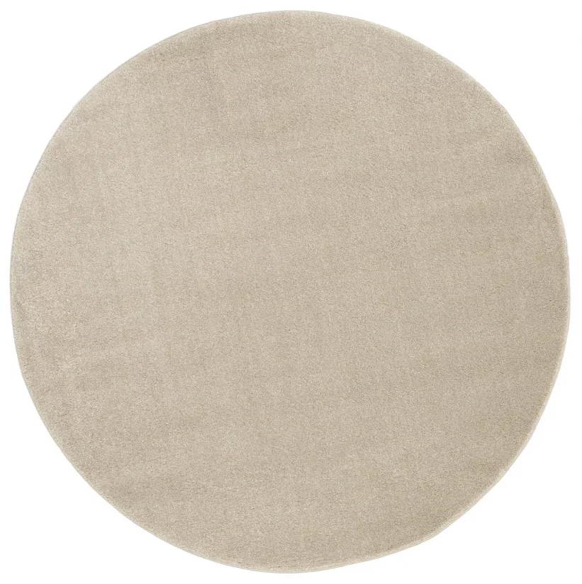 Jednofarebný béžový kruhový koberec s priemerom 200 cm.